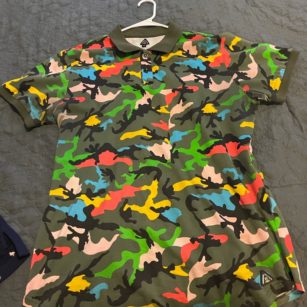 Limited edition multi colored camo polo.
